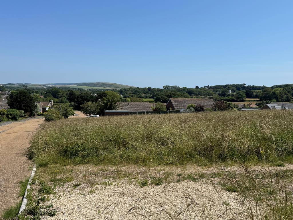Lot: 33 - OVER THREE-QUARTERS OF AN ACRE FREEHOLD LAND WITH PLANNING FOR SEVEN DETACHED BUNGALOWS - A Loom Down the Site with the View Beyond